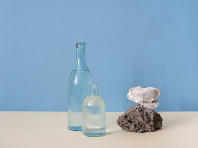 Water bottle on a clean white surface.